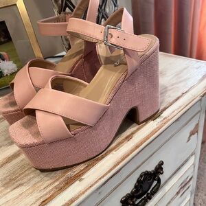 Soda brand pale pink shoes.